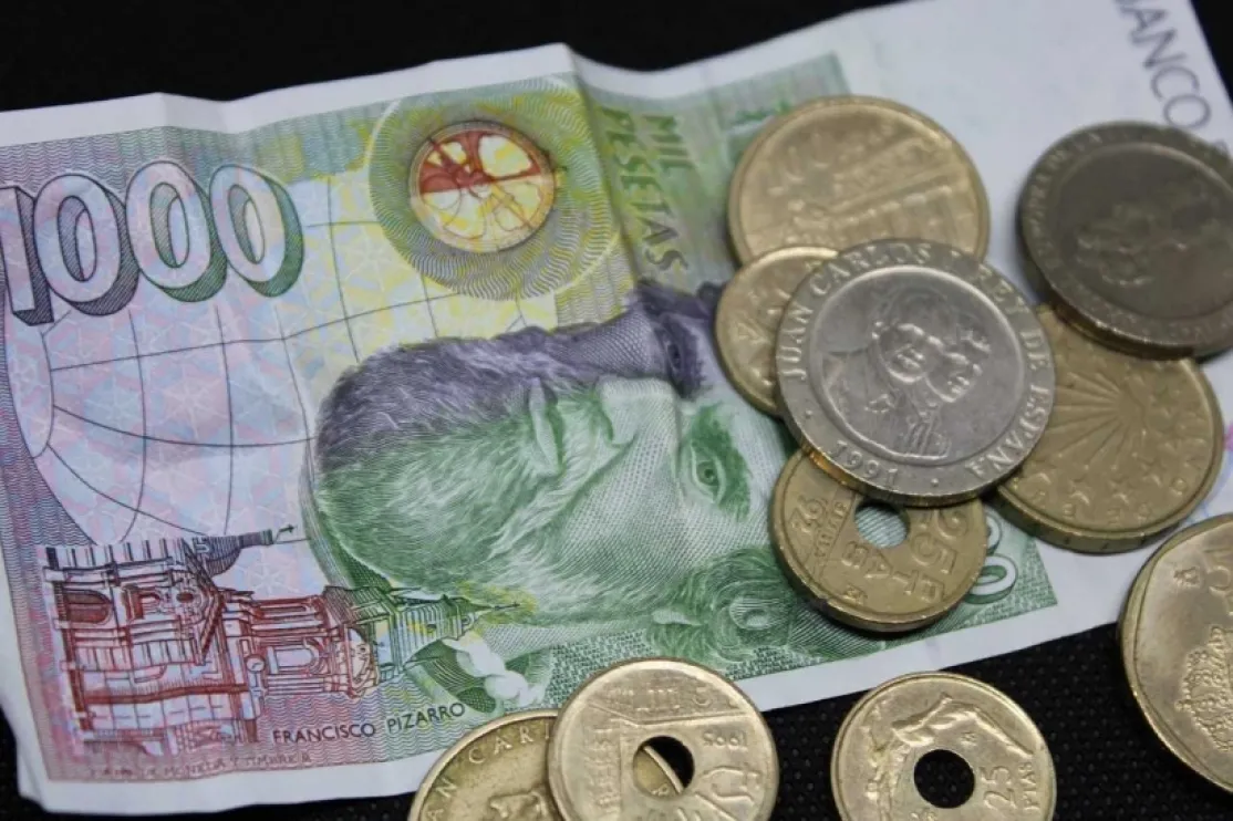 Billetes y monedas. Foto: Manos Unidas