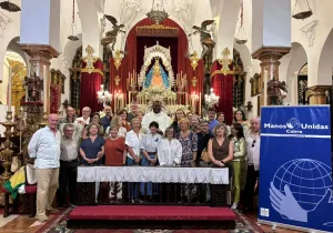 Manos Unidas ante los pies de la Patrona de Cabra