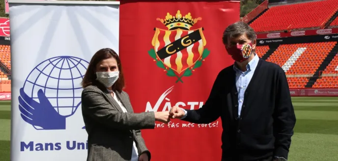 Firma convenio Nàstic y Manos Unidas