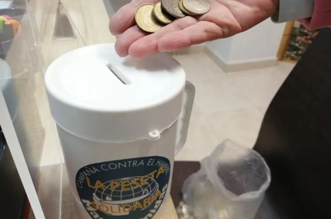 Campaña "Tus pesetas pueden salvar vidas" de Manos Unidas