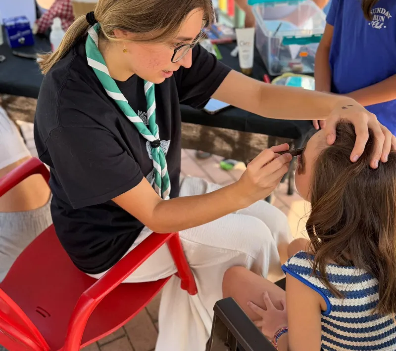 Pintacaras en fiesta solidaria en Quer