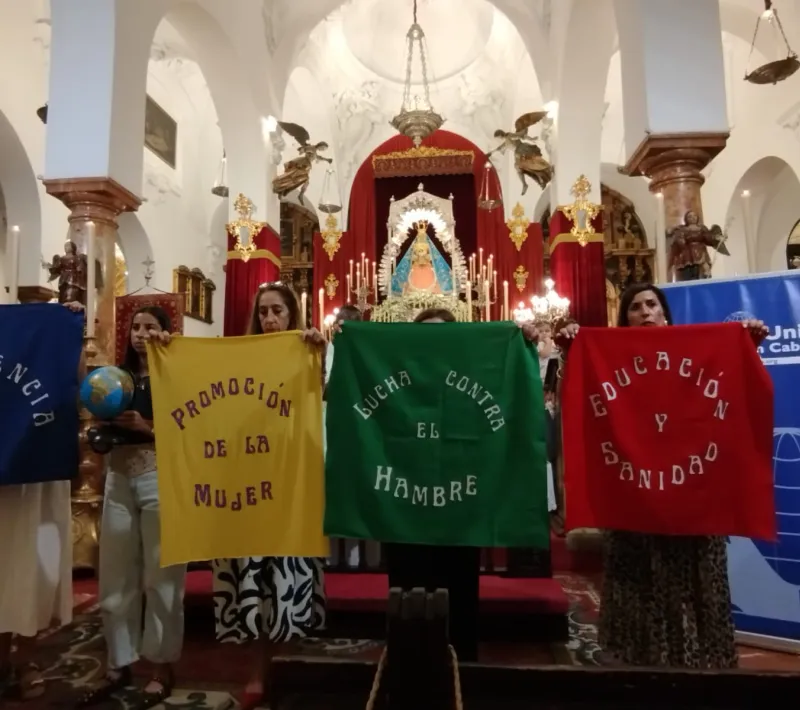 Voluntarios de Manos Unidas Cabra durante la celebración eucarística