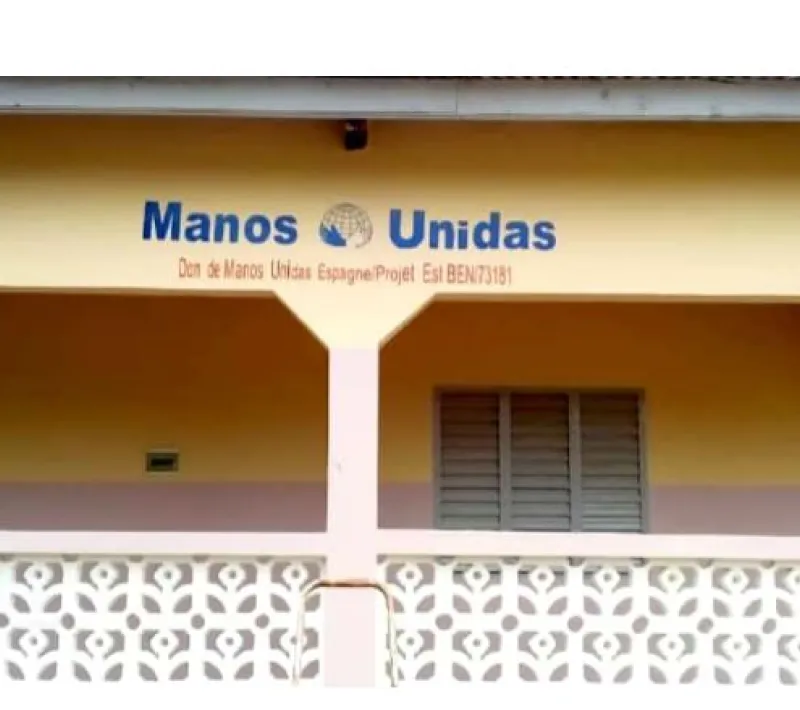 btiment avec symbole de manos unidas