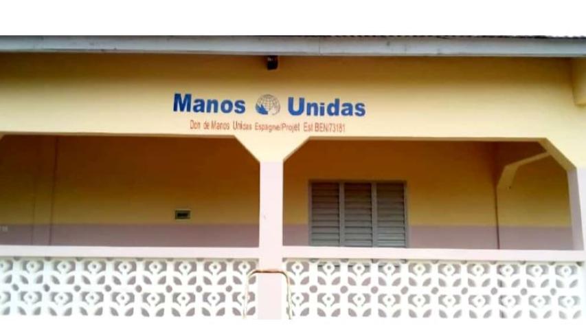 btiment avec symbole de manos unidas