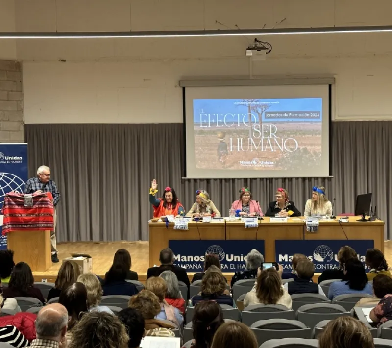 Presentación de los viajes de formación durante las Jornadas. Fotografía: Manos Unidas.