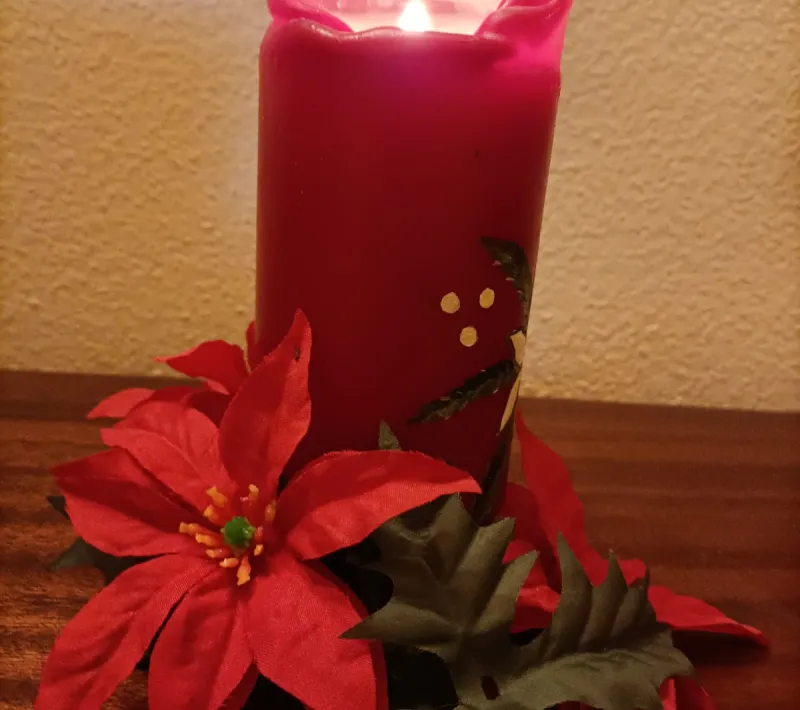 Ana Mª Alises también muestra su vela encendida con MM.UU.
