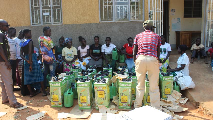 members of tickutego group pose for a photo after distribution