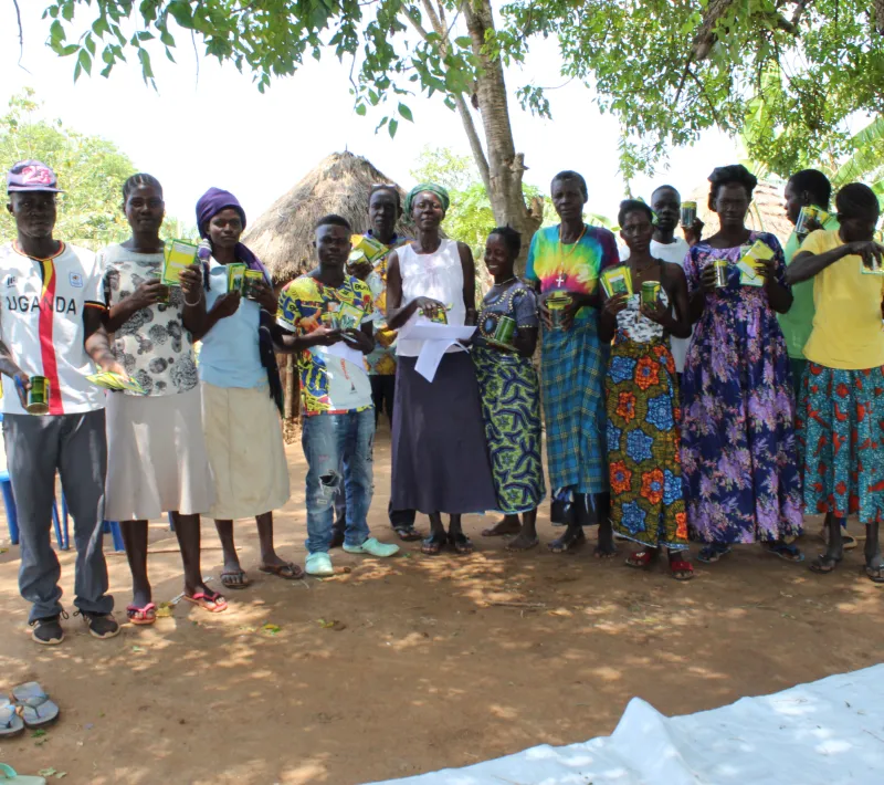 members of tickutego group pose for a photo after receiving their horticultural crop