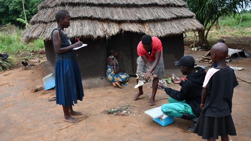 mrs. ouchi teddy takes on vaccination records as the sub county vets does the vaccination