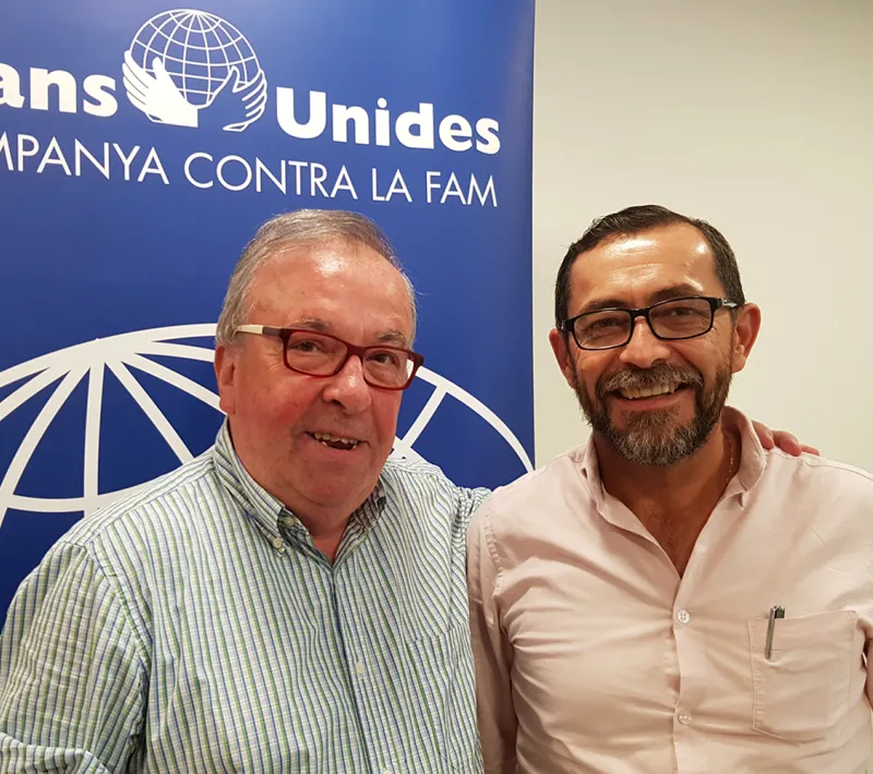 El presidente de Manos Unidas Barcelona, Joan Martí, junto a Sergio Godoy